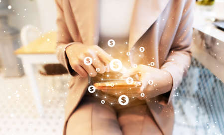 Asian woman hand using mobile smart phone with online transaction application. Concept of financial technology (fintech)の写真素材