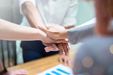 Team teamwork business join hand together concept, Power of volunteer charity work, Stack of people handの写真素材