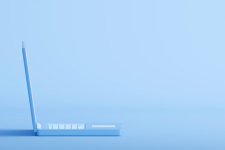 Computer laptop on cyan background. Minimal design with copy space. 3d rendering illustrationの写真素材