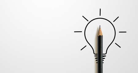 Black colour pencil with outline light bulb and word idea on white paper background. Creativity...