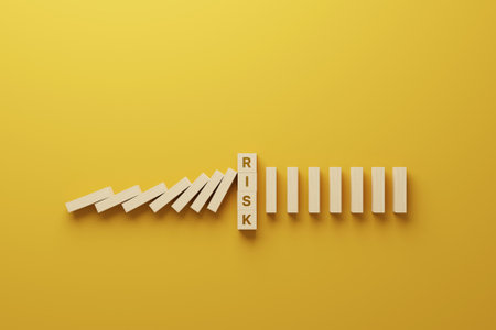 Risk management concept. Top view wooden block stopping domino effect for business. 3d render illustrationの写真素材