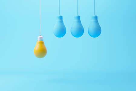 Hanging light bulb yellow outstanding among lightbulb group. Concept of creative idea and innovation, Unique, Think different, Individual and standing out from the crowd. 3d render illustrationの写真素材
