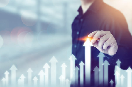 Business development to success and growing growth concept. Businessman pointing arrow graph corporate future growth planの写真素材