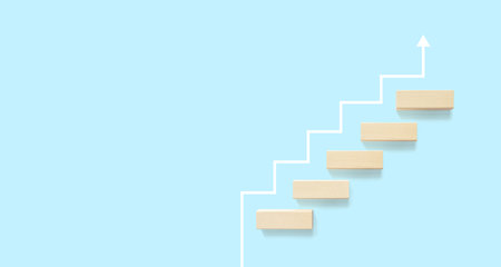Growth or increase design concept. Cube block staircase moving step growing up to target. Success achievement or goal business motivationの写真素材
