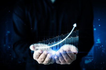 Business development to success and growing growth concept. Businessman hand holding virtual arrow graph corporate future growth planの写真素材