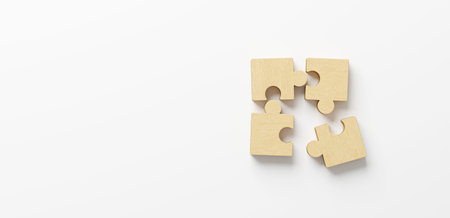 Wooden jigsaw puzzle connecting together. Team business success partnership or teamwork concept. 3d rendering illustrationの写真素材