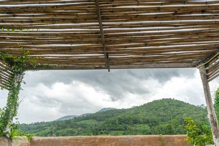 bamboo roof and mountainの写真素材