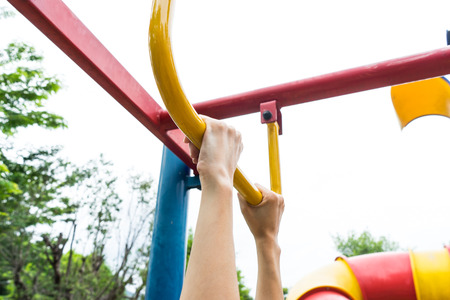 Hands hanging bar