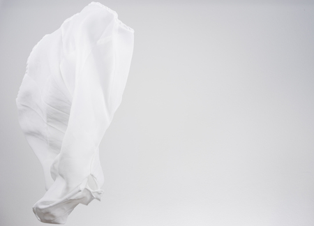 White shirts fabric flying, studio shot , scarf motionの写真素材