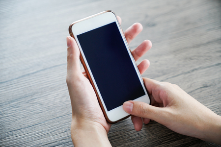 the women hand use mobile phone , shopping onlineの写真素材