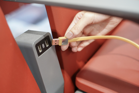 Close up on battery charger at seat  in the airport for traveler.の写真素材