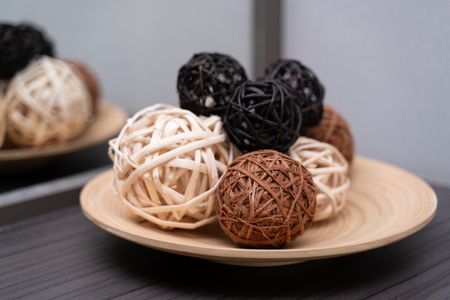 Vine ball or Rattan Ball decoration on dishの写真素材