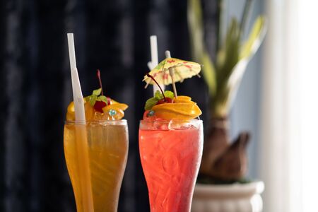 colorful soft drinks, cocktail in long transparent glass