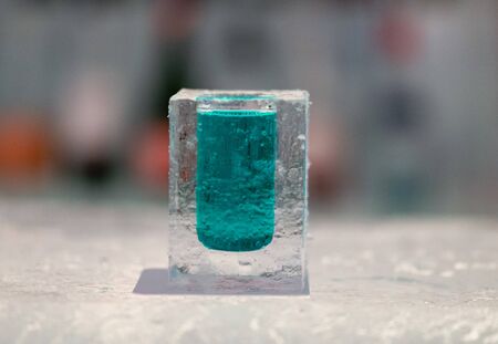 Cocktail short glass made of ice. In Igloo ice bar in winter season.の写真素材