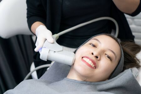 HIFU treatment on female face. High Intensity Focused ultrasound. Anti aging treatment and plastic...