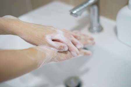 Washing hands with soap. For killing germs, bacteria and virus.の写真素材