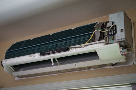 technician open for cleaning air conditioner indoors.の写真素材