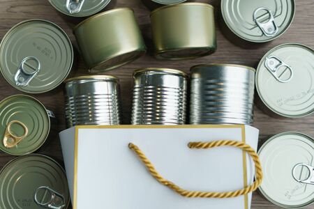 Canned food in shopping bag with group of Aluminium canned food.の写真素材