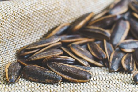 Sunflower seed on a sack background.