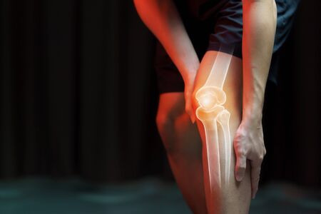 Medical concept, man suffering  with knee painful - skeleton x-ray,の写真素材