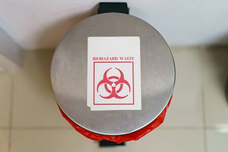 Close up bin for hazardous waste in hospital.