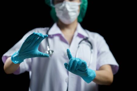 Doctor hand hold transparent tablet display showing empty in screen.の写真素材