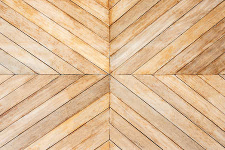 seamless brown color lumber in arrows or chevron pattern to the center. top viewの写真素材