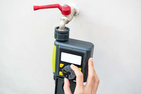 Digital garden timer, hand setup schedules program for garden watering.