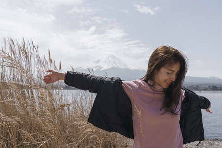 woman tourist at Mt Fuji, lake kawaguchiko, Japan.の写真素材