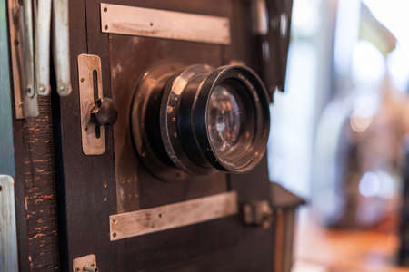 Vintage, antique large format camera in blurred background.の写真素材