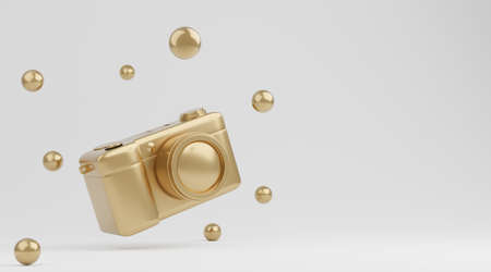 Gold camera on white background, technology concept. 3d renderingの写真素材
