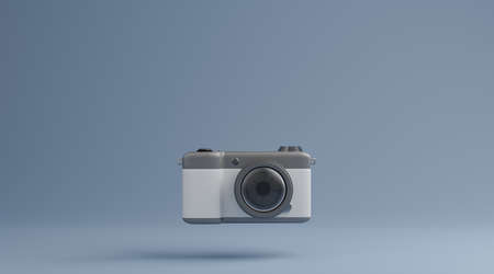 Vintage camera over blue background photography concept. 3d renderingの写真素材