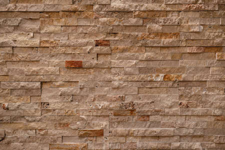 Black stone brick wall background, marbled textured.の写真素材