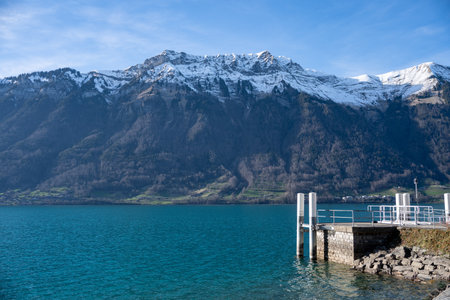 Mountain and lake in Iseltwald at Lake Brienz in Switzerland.の写真素材