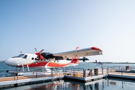 Woman with a seaplane background before boarding.