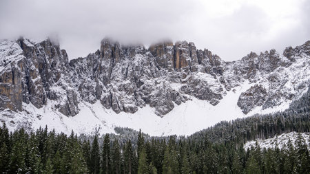 Mountain peaks at Karersee in Dolomites Italy.
