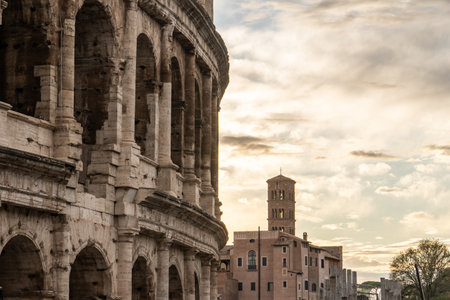 Arches archictecture of Colosseum (Colosseo) exterior with clouds and sky. Rome, Italy.の写真素材
