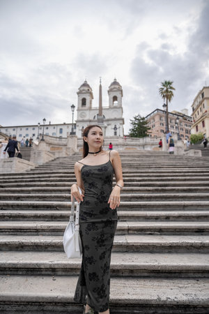 Woman enjoy view of  Spanish steps (piazza di spagna) in Rome, Italy.の写真素材
