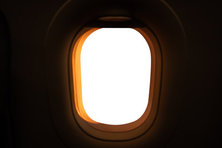 White screen mockup through window of wing of plane.の写真素材