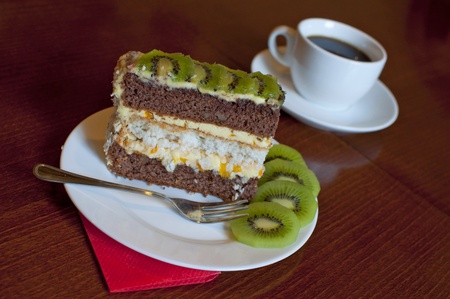 Kiwi fruit cake, black coffee の写真素材