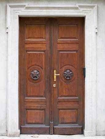 Old large metal door - door portal - white background の写真素材