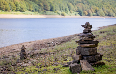 two towers made from rocks and stonesの写真素材