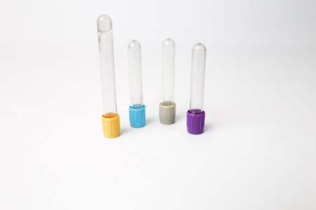 different blood test tubes on white backgroundの写真素材