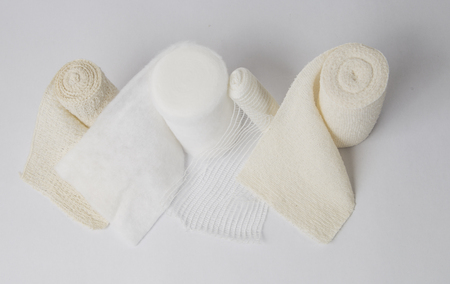 different kinds of bandages standing on the white backgroundの写真素材