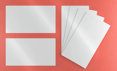 3d render illustration of visit card mockup on a color background. Top view.の写真素材