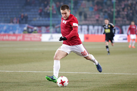 KRAKOW, POLAND - FEBRUARY 11, 2017: Polish Premier Football League Wisla Krakow - Korona Kielce o/p Patryk Maleckiのeditorial素材