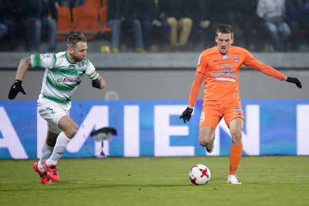 NIECIECZA, POLAND - FEBRUARY 17, 2017: Polish Premier Football League Termalica Bruk-Bet Nieciecza - Lechia Gdansk o/p Jakub Wawrzyniak David Gubaのeditorial素材