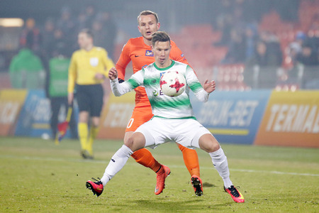 NIECIECZA, POLAND - FEBRUARY 17, 2017: Polish Premier Football League Termalica Bruk-Bet Nieciecza - Lechia Gdansk o/p Michal Mak Roman Gergelのeditorial素材