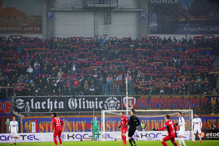 GLIWICE, POLAND - FEBRUARY 18, 2017: Polish Premier Football League Piast Gliwice - Lech Poznan o/p football fansのeditorial素材