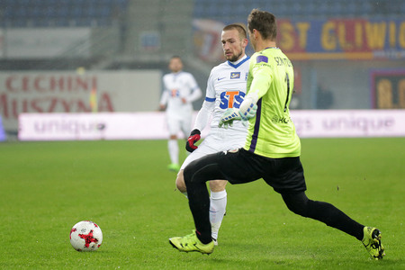 GLIWICE, POLAND - FEBRUARY 18, 2017: Polish Premier Football League Piast Gliwice - Lech Poznan o/p Szymon Pawlowski Jakub Szmatulaのeditorial素材
